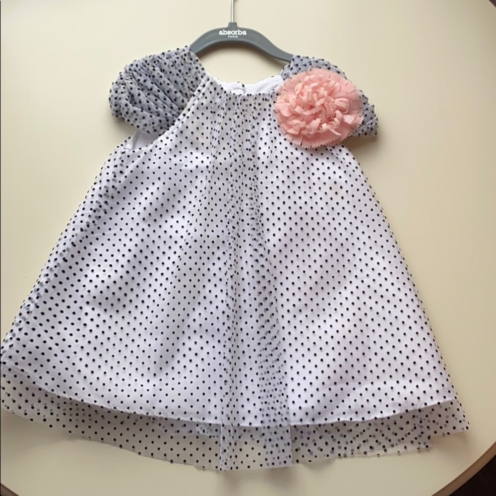 Polka dot dress with pink flower